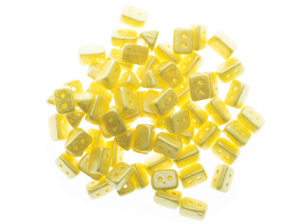 Dvoudírkové korálky Trios 6x4mm, barva žlutý vosk 1 Dvoudírkové korálky Trios 6x4mm, barva žlutý vosk