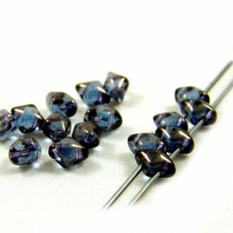 Dvoudírkové korálky Vario 5x3mm, barva modročerná