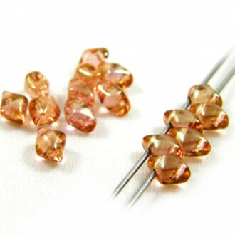 Dvoudírkové korálky Vario 5x3mm, barva oranžová