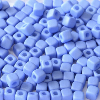 Mačkané korálky kostičky Cube 6x6mm, barva světle modrá