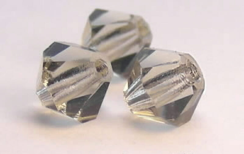 MC perle Bicone 4mm, barva světle šedá 1 MC perle Bicone 4mm, barva světle šedá