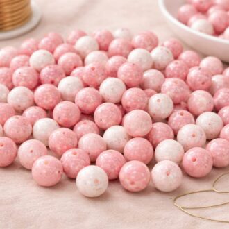 Korálek mačkaný, průměr 8mm, barva mix růžová, zušlechtění růžový poprsk