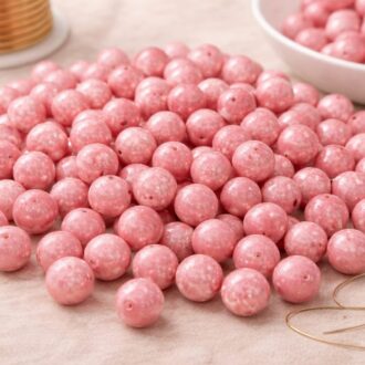 Korálek mačkaný, průměr 8mm, barva mix růžová, zušlechtění stříbrný poprsk